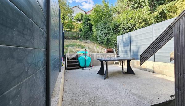 Maison de ville sur sous-sol complet avec véranda, jardin et garage à Épinal