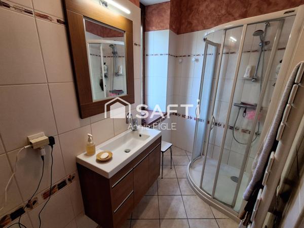 200 m2 habitables, grand garage et grand terrain