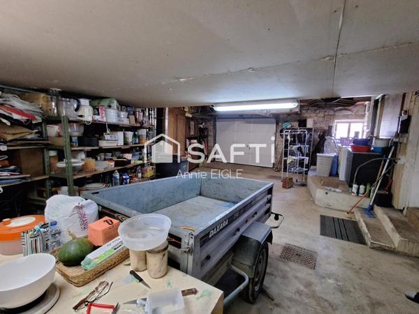 200 m2 habitables, grand garage et grand terrain