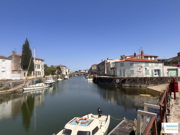 T3 de caractère avec vue sur le port, le clocher et le marché