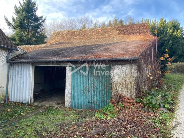 Longère avec 5 800 m2 de terrain à Yvré le Pôlin
