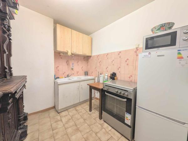 APPARTEMENT 60 M² AVEC TERRASSE ET PARKING COUVERT