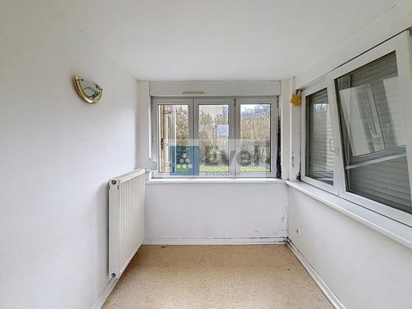 Maison individuelle - avec garage- terrain - 2 chambres