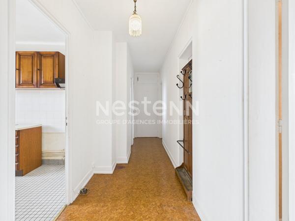 Aurillac, quartier viaduc, à Vendre Appartement de type 3 d'une surface de 85 m² avec balcon et cave.