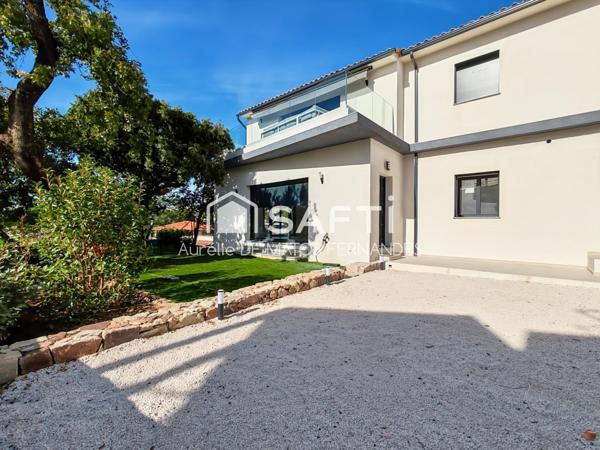 Rez de jardin, 2 place de parking, cave