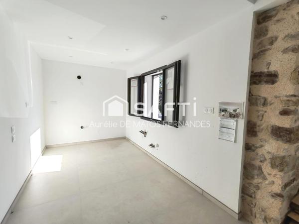 Rez de jardin, 2 place de parking, cave