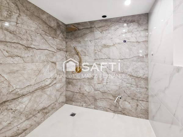 Rez de jardin, 2 place de parking, cave