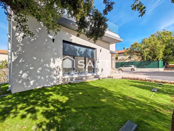 Rez de jardin, 2 place de parking, cave