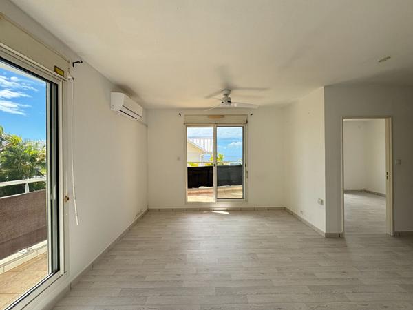 97490 LA BRETAGNE A LOUER - Sainte-Clotilde La Bretagne - Appartement T3 lumineux avec varangue, balcon et vue mer