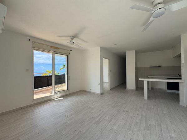 97490 LA BRETAGNE A LOUER - Sainte-Clotilde La Bretagne - Appartement T3 lumineux avec varangue, balcon et vue mer