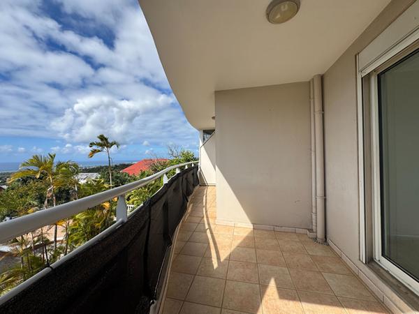 97490 LA BRETAGNE A LOUER - Sainte-Clotilde La Bretagne - Appartement T3 lumineux avec varangue, balcon et vue mer