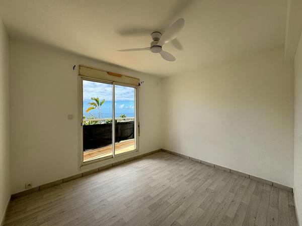 97490 LA BRETAGNE A LOUER - Sainte-Clotilde La Bretagne - Appartement T3 lumineux avec varangue, balcon et vue mer