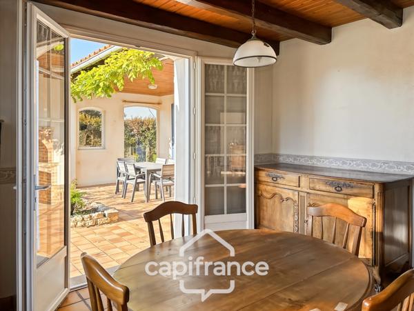 Maison 165 m² avec beaux volumes et jardin paysager – Fontaines