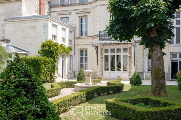 Appartement dans un hôtel particulier du 19ème avec son jardin privatif et son orangerie