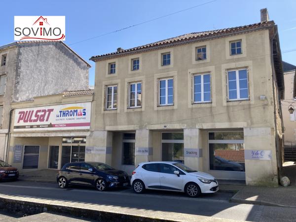AU COEUR DE LA VILLE, IMMEUBLE À USAGE COMMERCIAL ET HABITATION