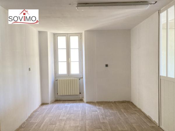 AU COEUR DE LA VILLE, IMMEUBLE À USAGE COMMERCIAL ET HABITATION