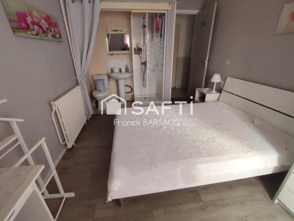 IMMEUBLE DE RAPPORT AVEC ANNEXE ET PATIO