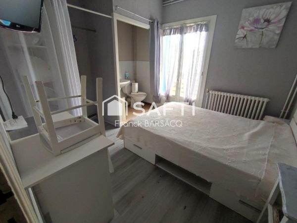 IMMEUBLE DE RAPPORT AVEC ANNEXE ET PATIO