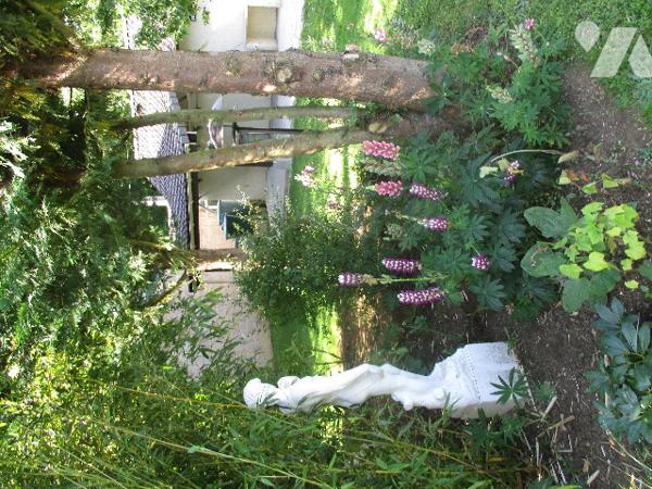Garage avec terrasse sur terrain de 409m².