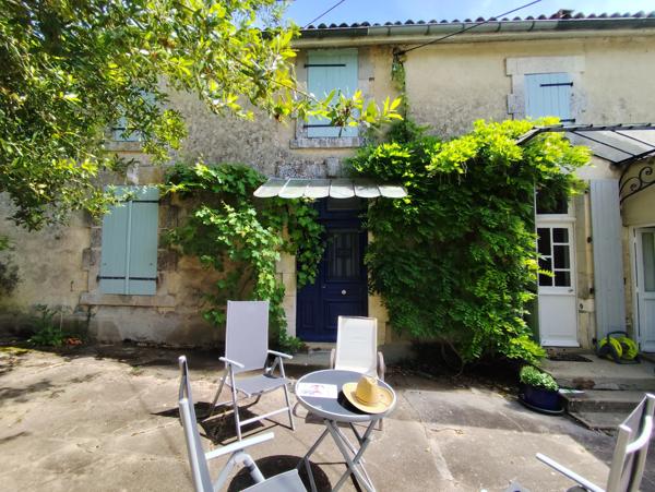 Élégante maison de village de style Belle Époque comprenant 4 chambres, un jardin, des granges et un potentiel exceptionnel