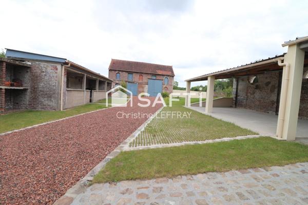 Maison 5 chambres, 27 garages, 8700 m² de terrain.