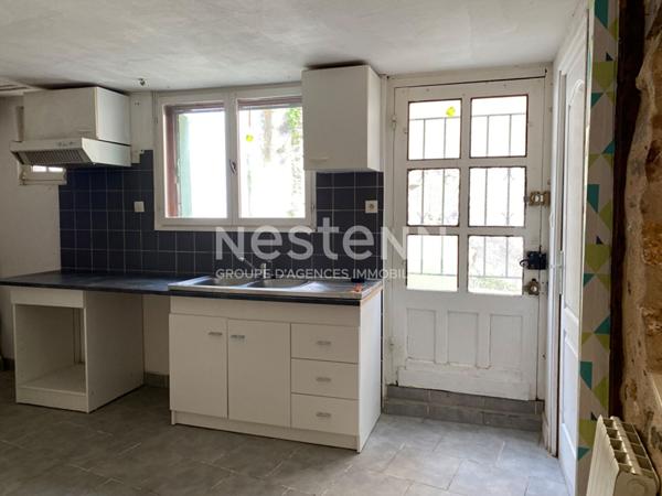 Maison en pierre dans Nontron avec garage et proche de tous commerces