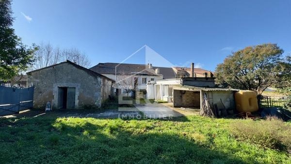 Maison de caractère aux multiples possibilités au coeur du village