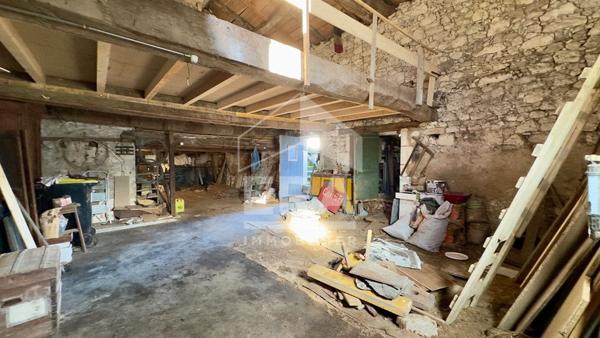 Maison de caractère aux multiples possibilités au coeur du village