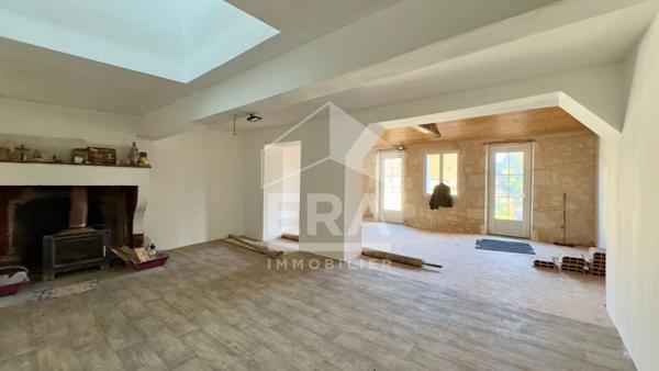 Maison de caractère aux multiples possibilités au coeur du village
