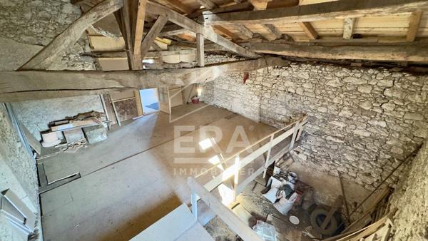 Maison de caractère aux multiples possibilités au coeur du village