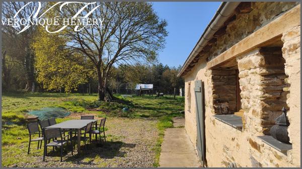Un havre de paix pour cette charmante chaumière sise sur 1,4 ha