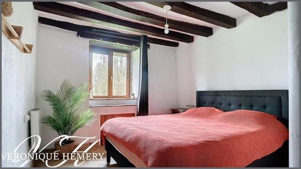 Un havre de paix pour cette charmante chaumière sise sur 1,4 ha