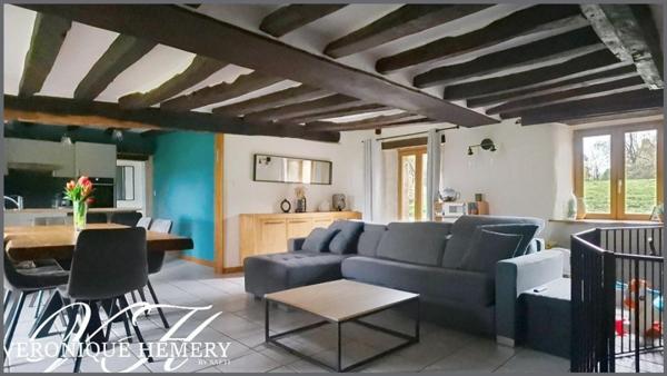 Un havre de paix pour cette charmante chaumière sise sur 1,4 ha