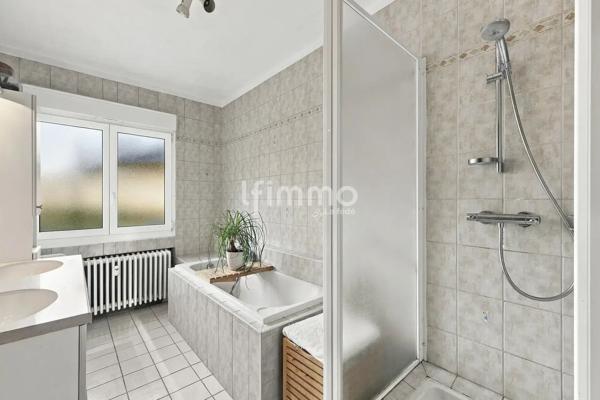 Appartement de 3 pièces de 95 m² avec terrasse-cave-parking