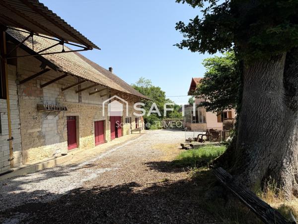 Maison d’habitation et dépendances de caractère au fort potentiel