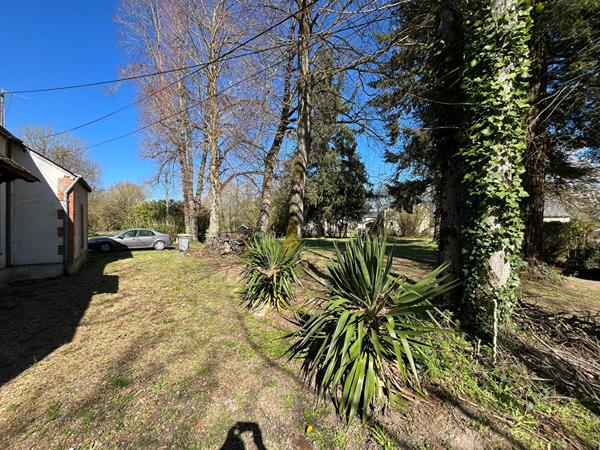 Maison très lumineuse au coeur d'un grand terrain