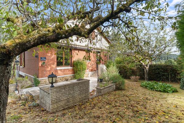 Une maison des années1930 dans son écrin de verdure