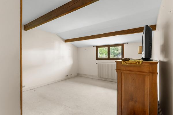 Une maison des années1930 dans son écrin de verdure