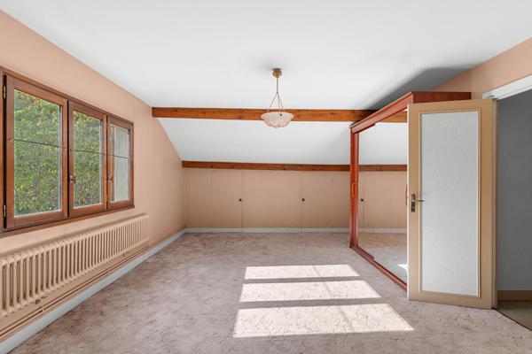 Une maison des années1930 dans son écrin de verdure