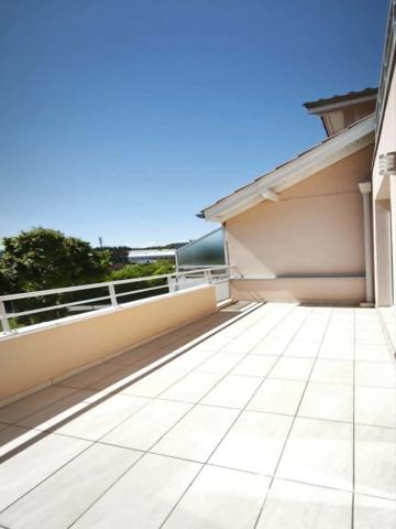 Appartement T4 de 84 m² double terrasse, garage et cave