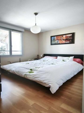 Appartement T4 de 84 m² double terrasse, garage et cave