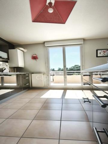 Appartement T4 de 84 m² double terrasse, garage et cave