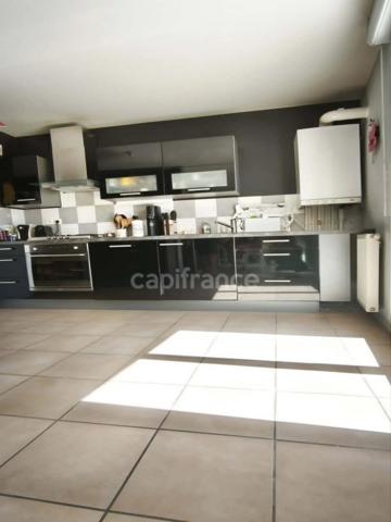 Appartement T4 de 84 m² double terrasse, garage et cave