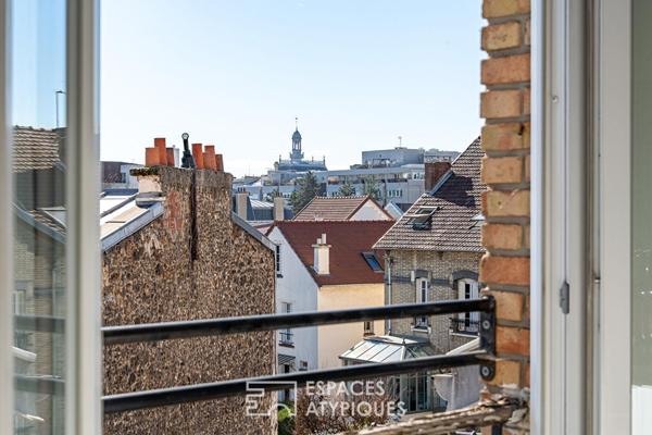 Duplex en dernier étage avec vue sur le beffroi de la mairie