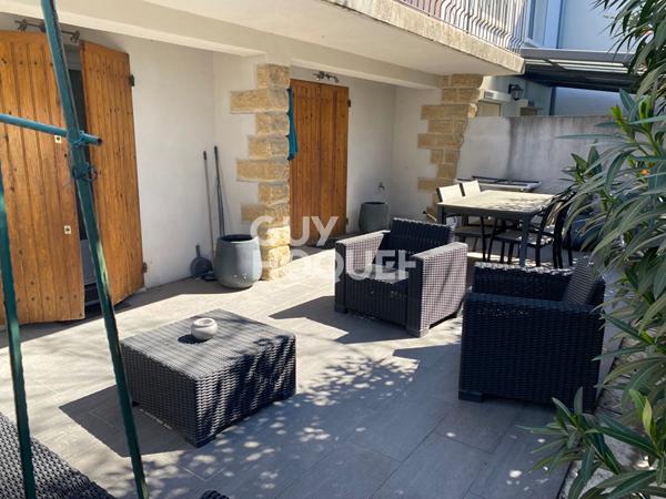 Appartement meublé T2 RDC d'une maison avec terrasse et parking