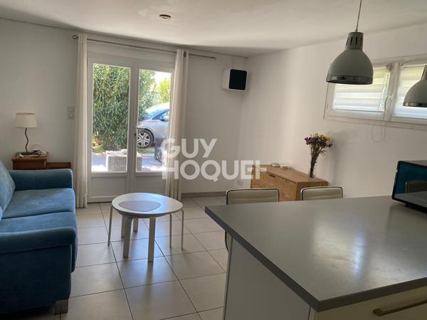 Appartement meublé T2 RDC d'une maison avec terrasse et parking