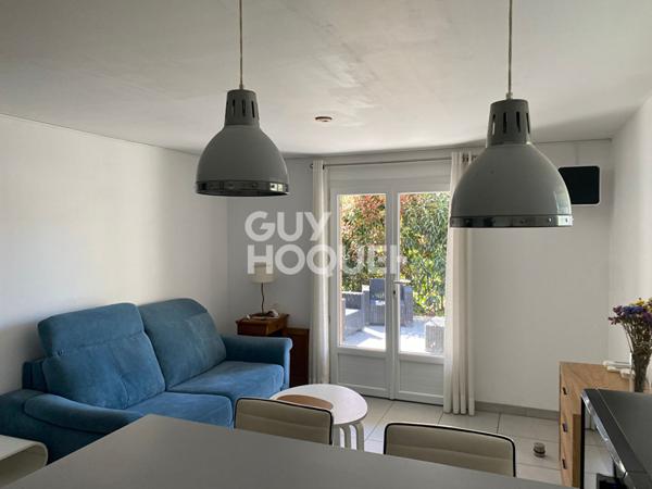 Appartement meublé T2 RDC d'une maison avec terrasse et parking