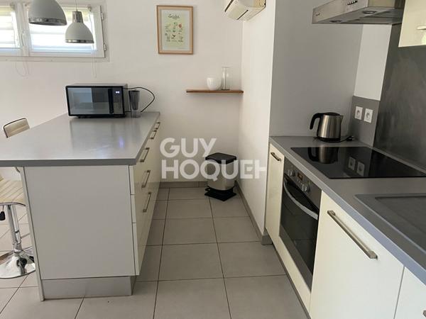 Appartement meublé T2 RDC d'une maison avec terrasse et parking