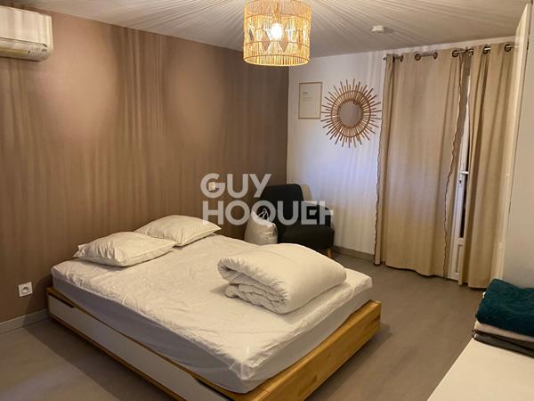 Appartement meublé T2 RDC d'une maison avec terrasse et parking