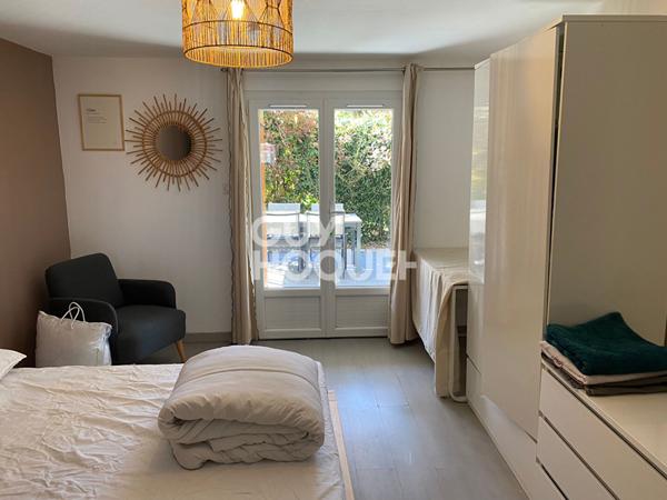 Appartement meublé T2 RDC d'une maison avec terrasse et parking
